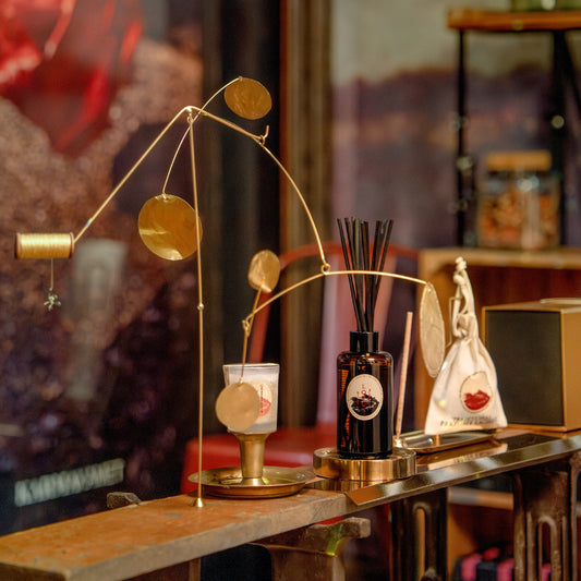 Karmakamet flagship store interior in Bangkok with diffuser and candle display
