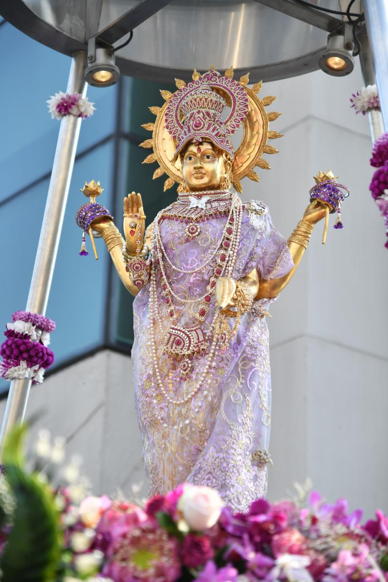 Golden statue of Phra Mae Lakshmi at the rooftop shrine of Gaysorn Village, Bangkok